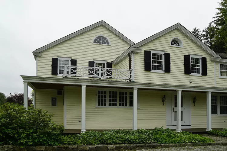 Back Side of Colonial Revival-Style House Before Renovation