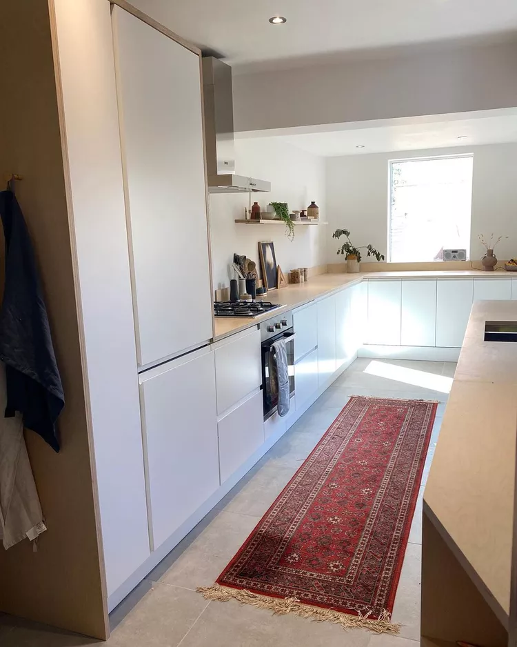 Small All-White Galley Kitchen